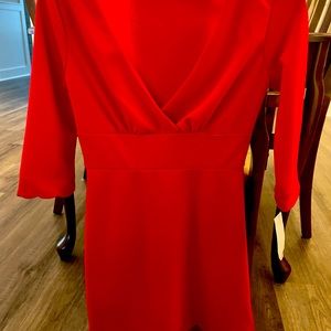 Brand new Red Size 0 cocktail dress, with tag. Smoke free home.